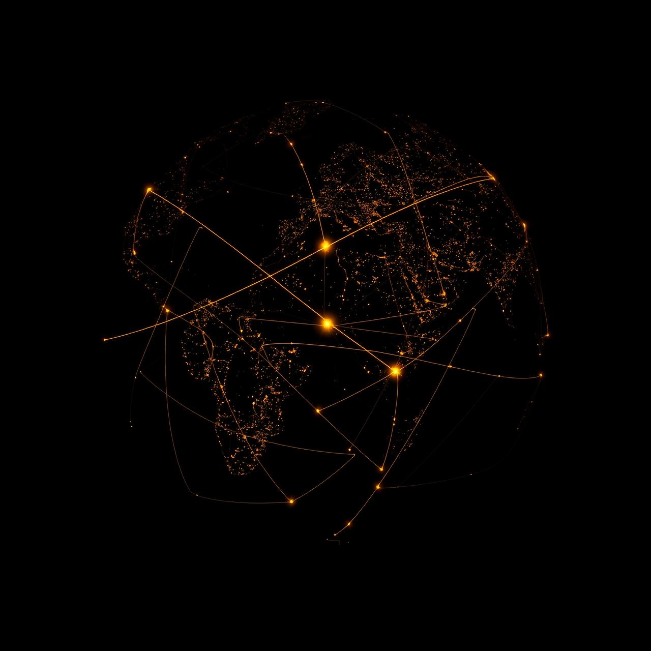 Illuminated globe with golden flight paths between global aviation hubs